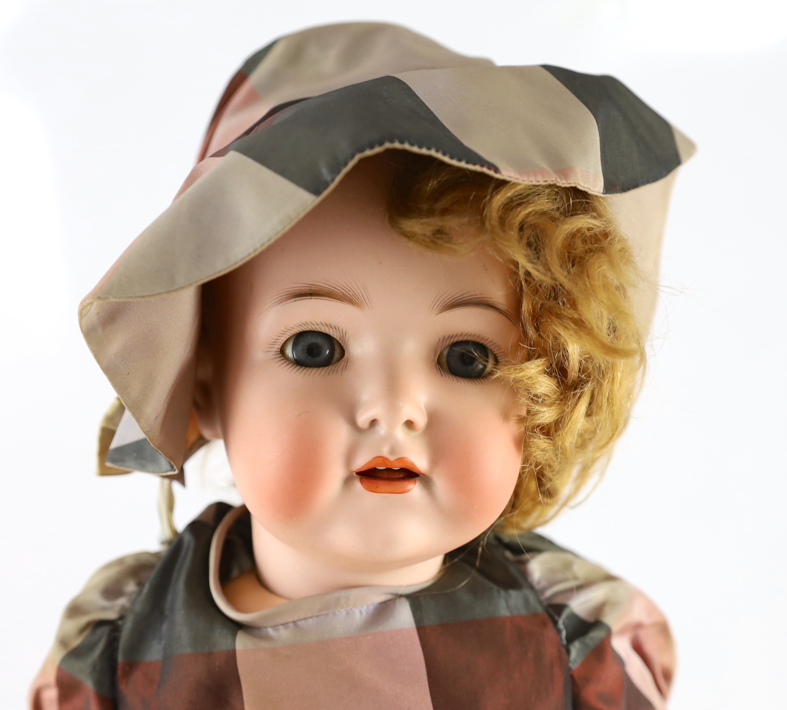 A Simon & Halbig walking-talking bisque doll, 9in.